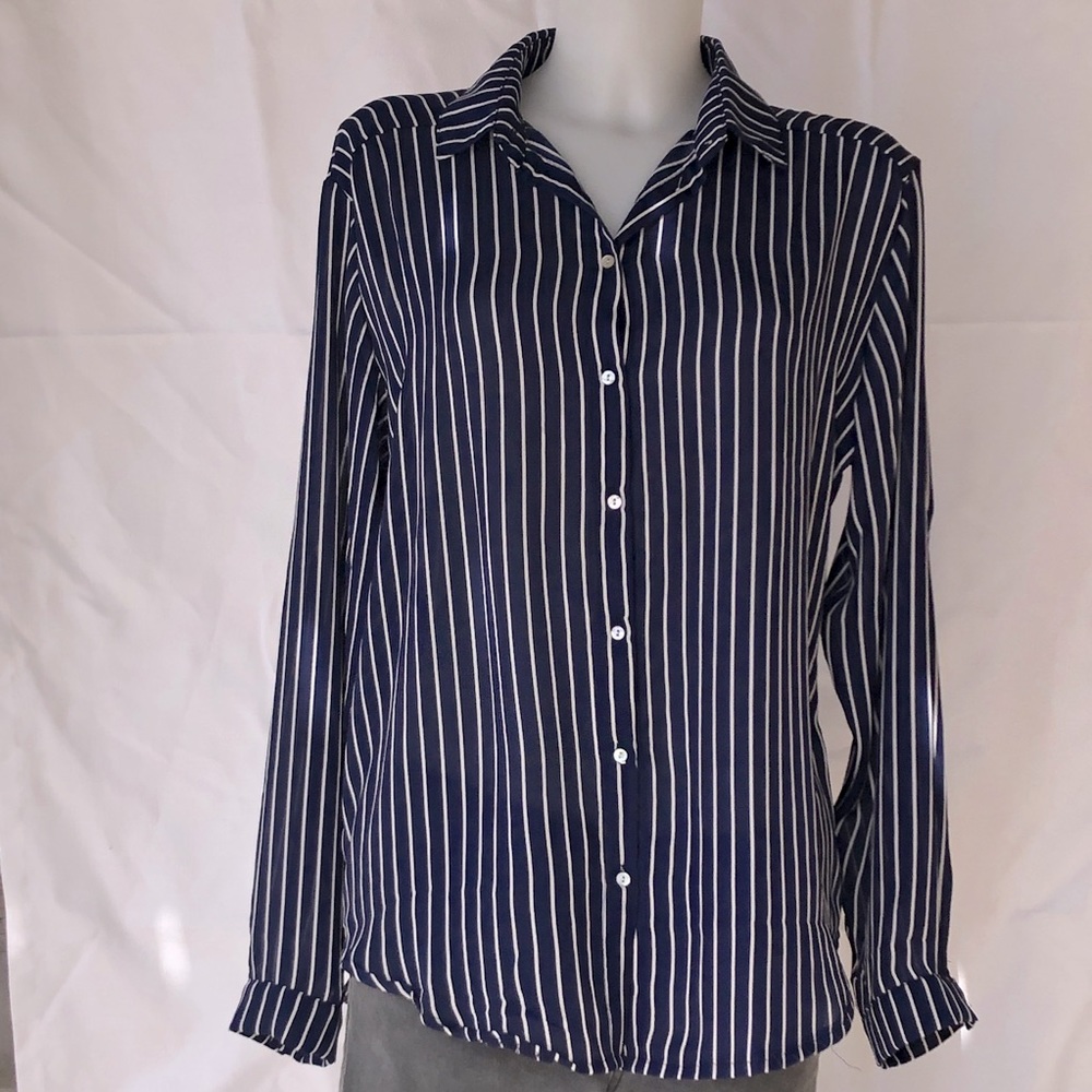 Navy blue pinstriped button down silky blouse .